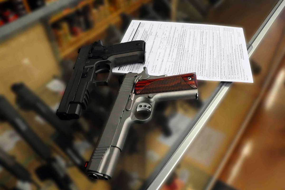 gun store counter with pistol and paperwork