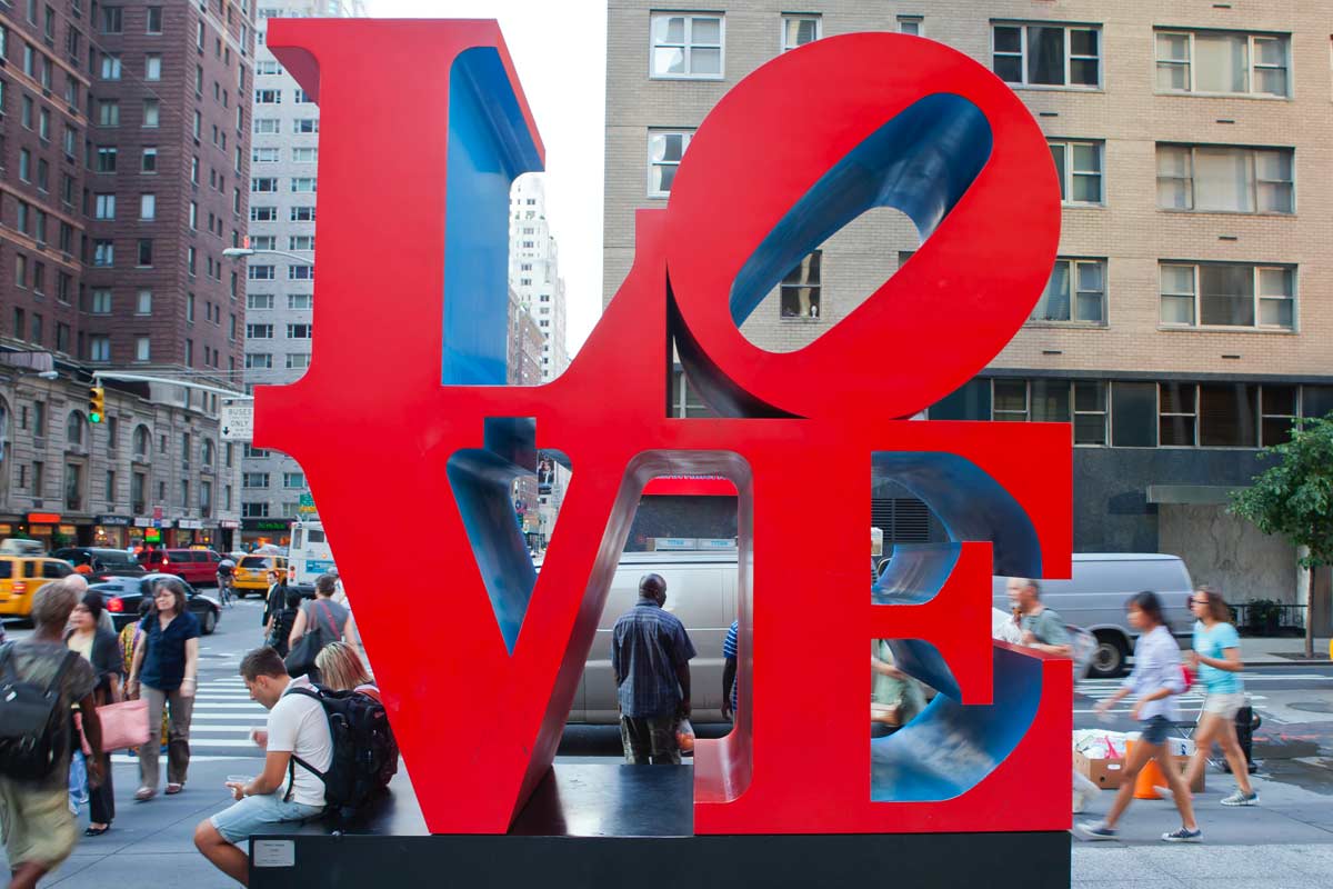 LOVE sculpture in Philadelphia with people on street